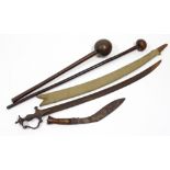 Two African knob-kerries; an Indian Tulwar sword with scabbard; & a Kukri (lacking sheath).
