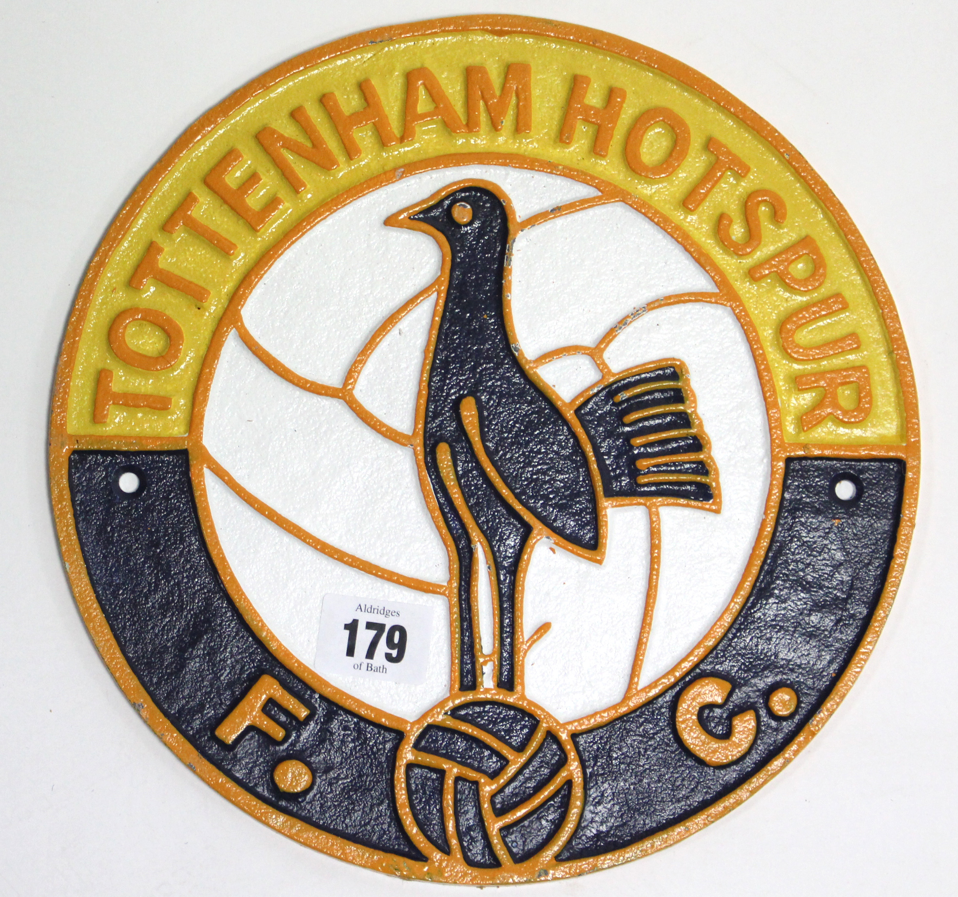 A ditto “Tottenham Hotspur” plaque, 9½” diam.