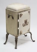 A Victorian-style white painted metal food cabinet enclosed by door, & on cast-iron cabriole legs,