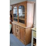 A VICTORIAN-STYLE PINE DRESSER, the upper part fitted two shelves enclosed by pair of glazed