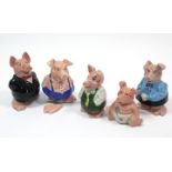 A set of five wade “Nat-West” pig money banks.