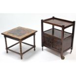 An oak rectangular three-tier tea trolley, the lower tier enclosed by pair of carved panel doors,