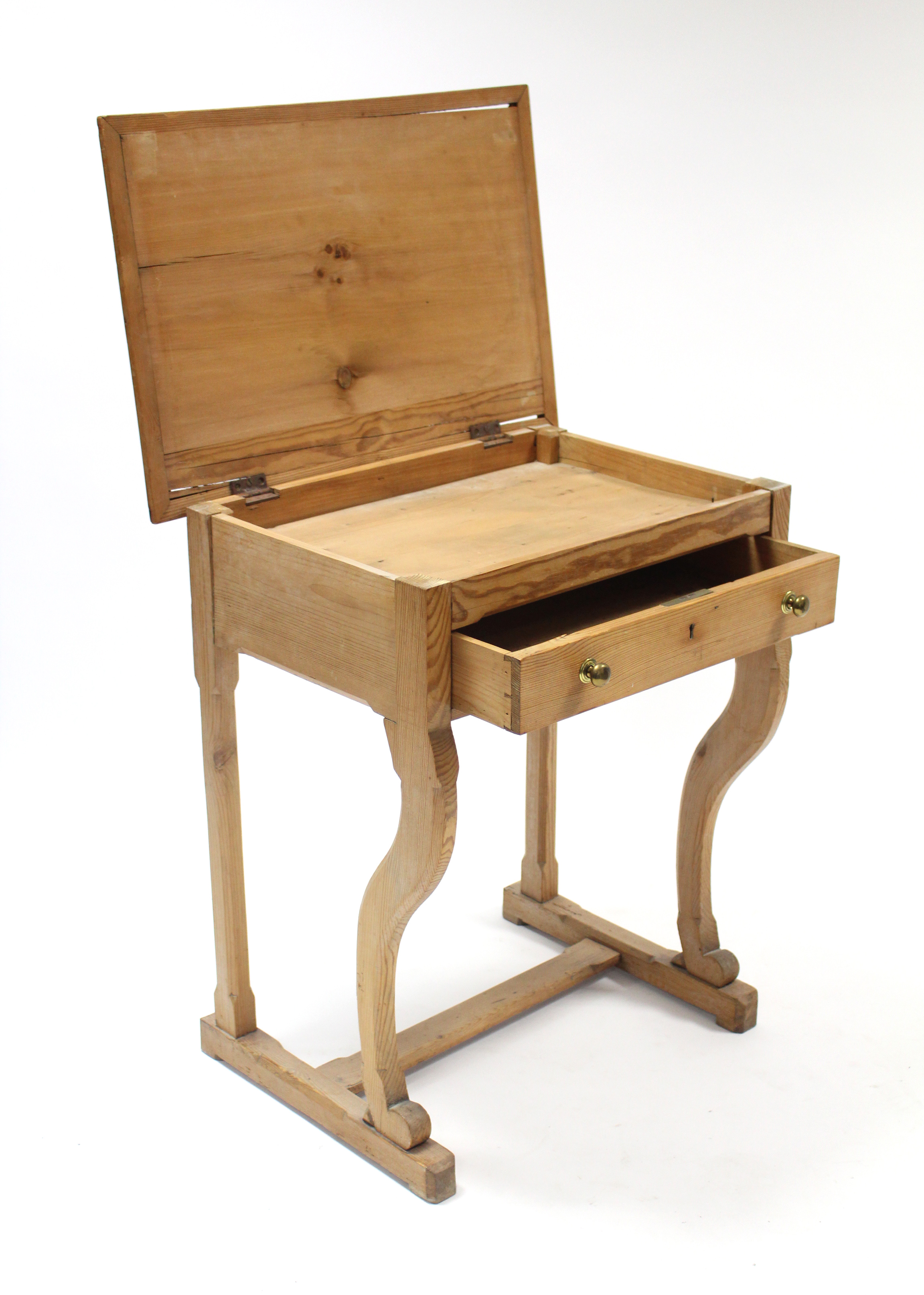 A pine child’s desk with hinged lift-lid, fitted frieze drawer, & on shaped front legs with plain - Image 2 of 2