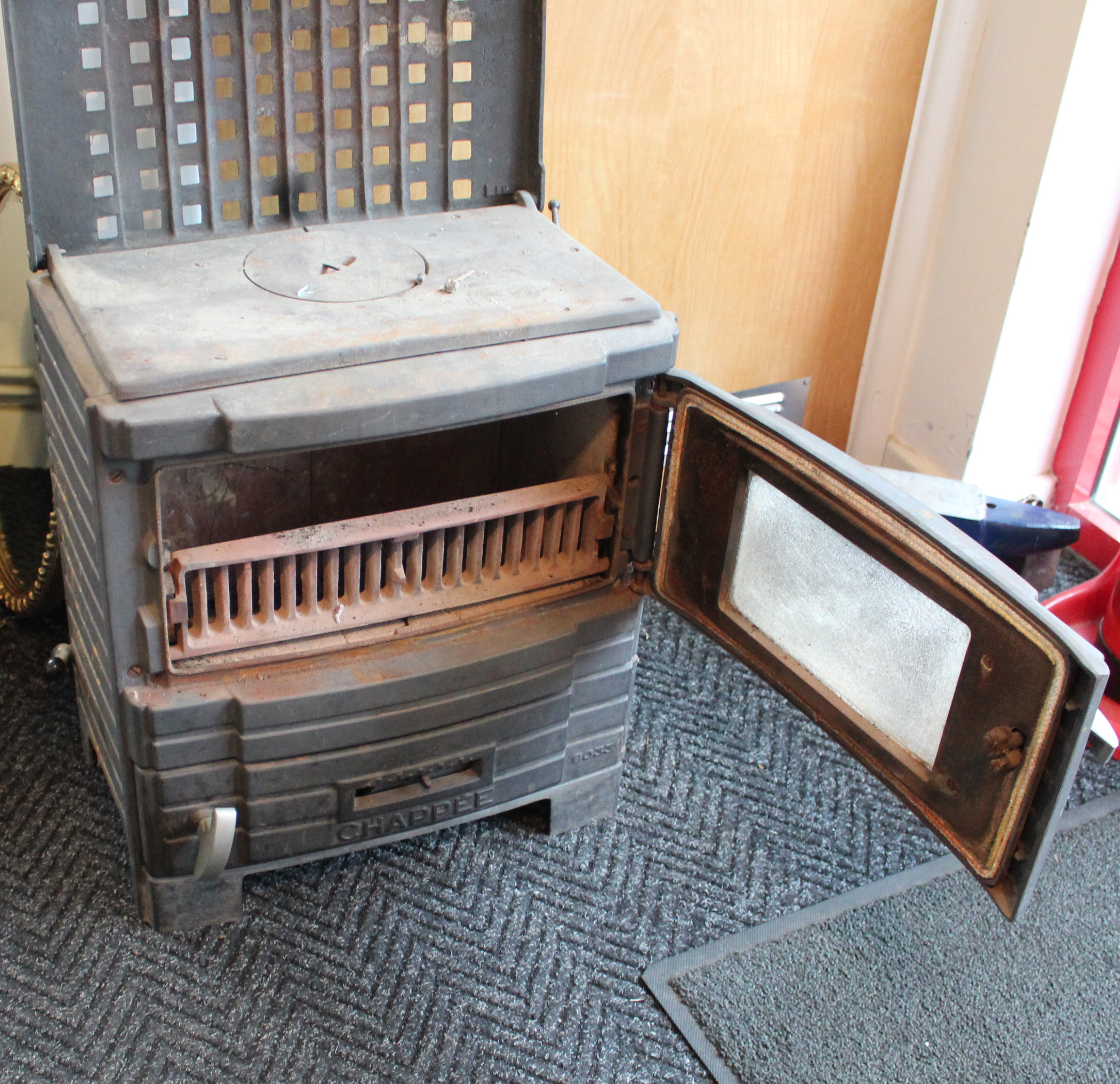 A Chappee wood-burning stove (No. 8033), in cast iron case, 19” wide x 22” high. - Image 3 of 3