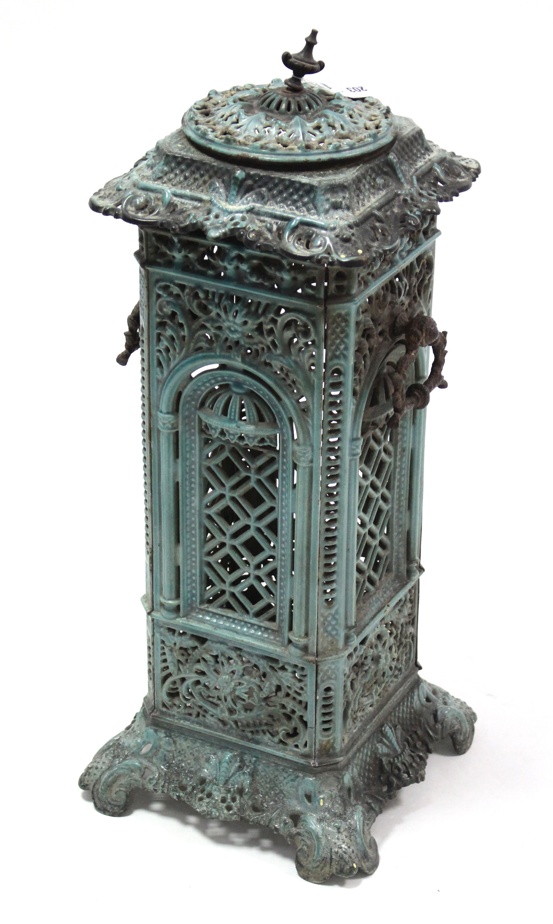 A turquoise enamelled cast-iron stove, 28½” high.