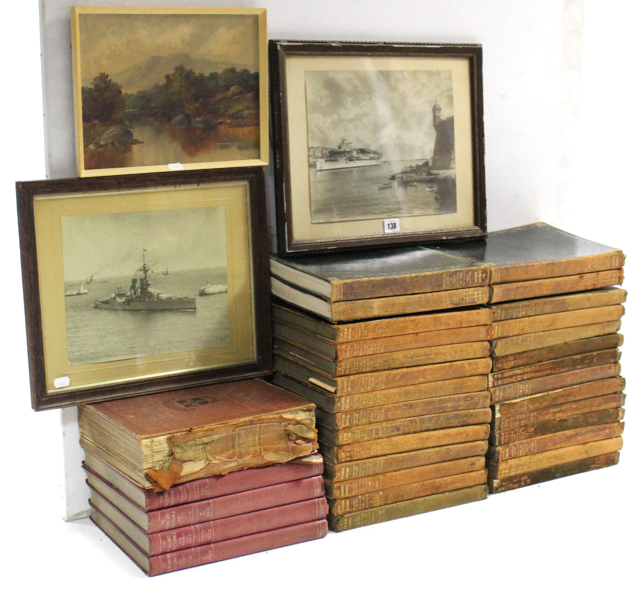 Two sepia naval photographs; a small oil painting on board titled to reverse “In the Vale of Clywd”,