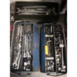 Three metal cantilever tool boxes containing numerous spanners, socket sets, etc.