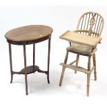 A wheel-back child’s high chair with hard seat, & on turned legs with spindle stretchers; & an