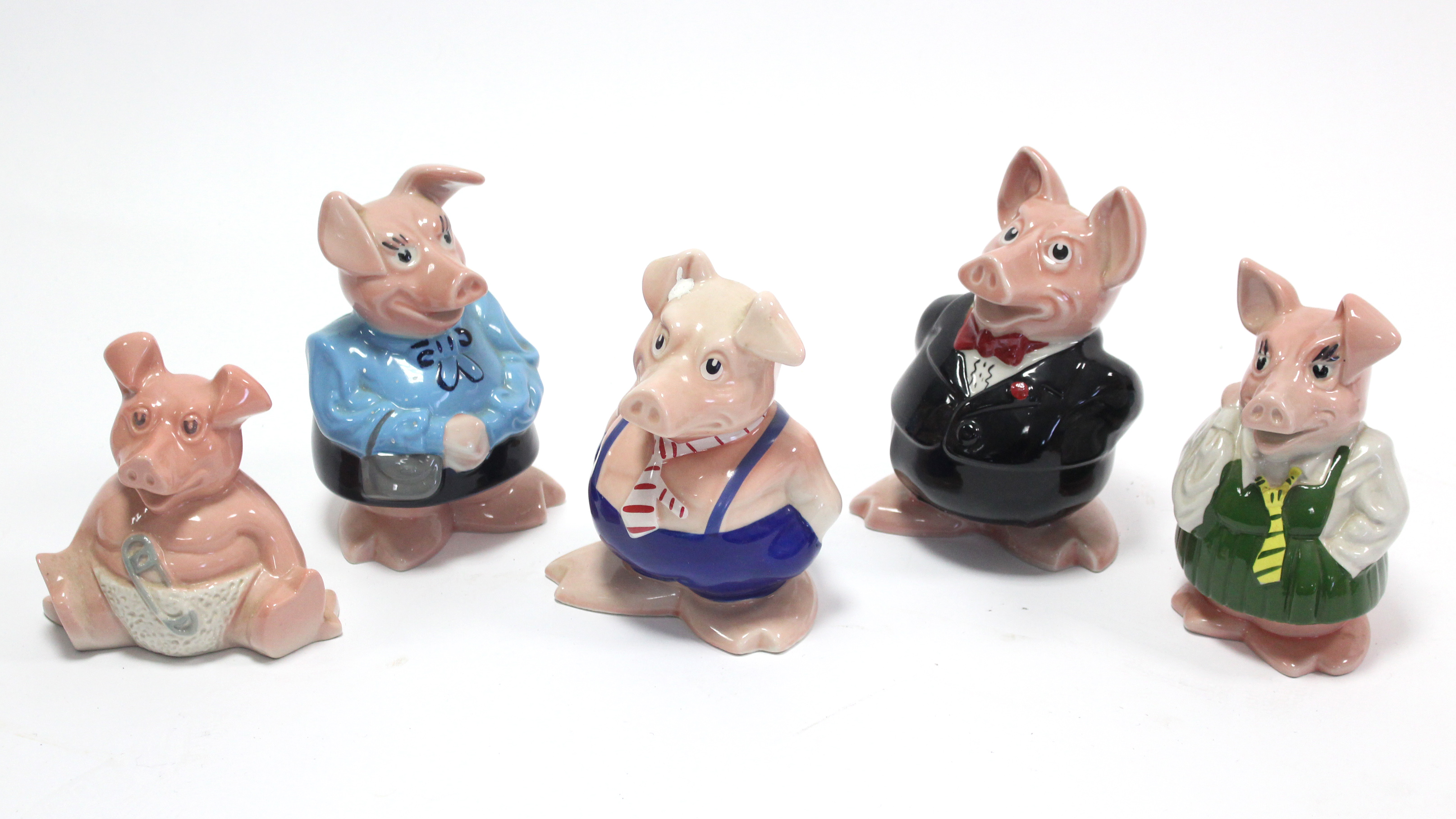 A set of five wade “Nat-West” pig money banks.