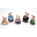 A set of five wade “Nat-West” pig money banks.