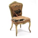 A Louis XV style carved giltwood frame child’s chair with shaped padded seat & back, on slender