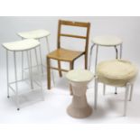 A pair of Kandya kitchen stools; a Caroma bedroom stool; two other stools; & a rail-back chair.