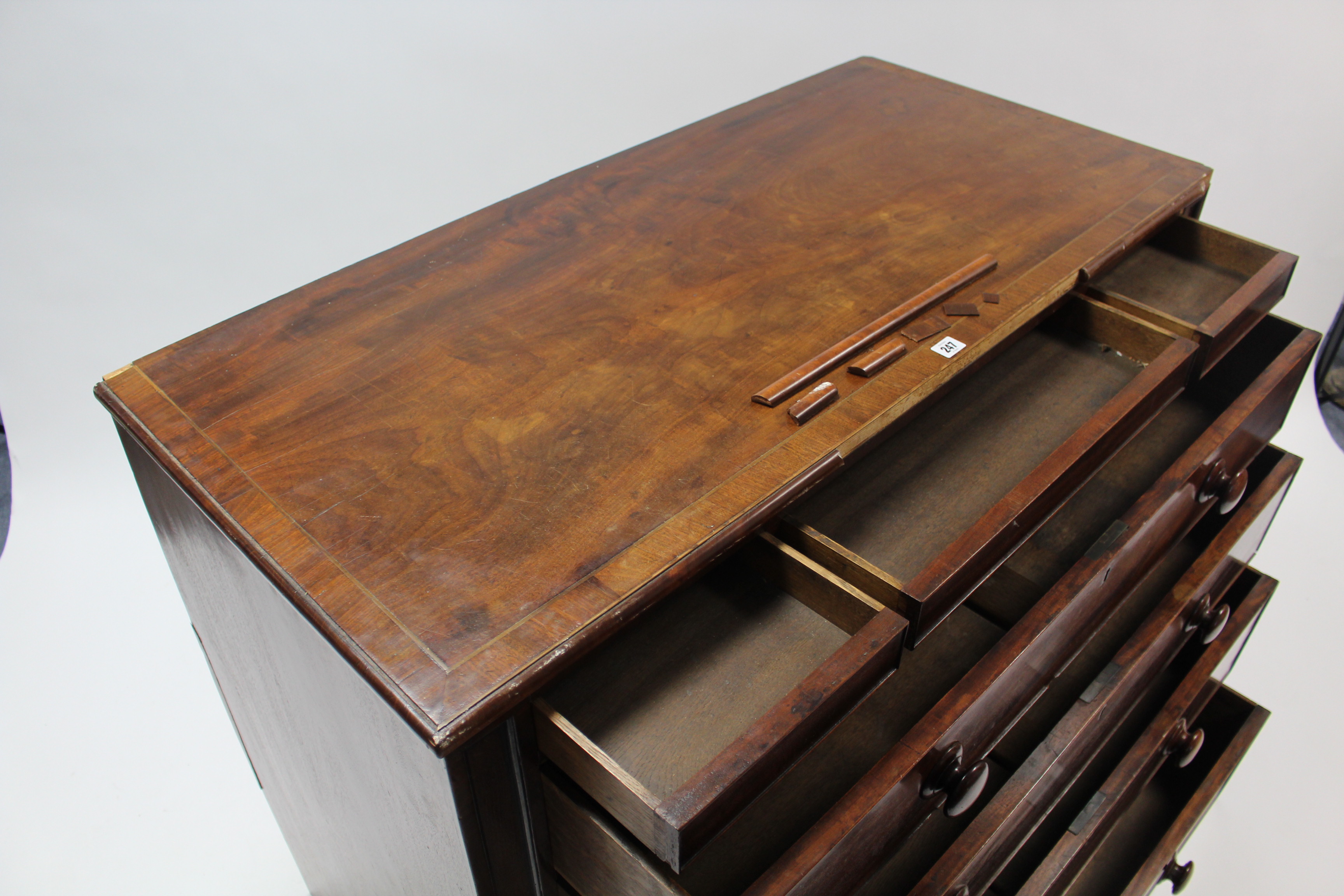 A 19th century inlaid-mahogany chest, fitted three shallow frieze drawers above four long - Image 3 of 4