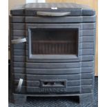 A Chappee wood-burning stove (No. 8033), in cast iron case, 19” wide x 22” high.