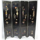 A Chinese black lacquered tall four-fold draught screen with coloured hardstone vase-of-flowers