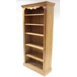 Another pine tall standing open bookcase with five adjustable shelves, & on plinth base, 36” wide