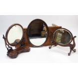 Two mahogany oval swing toilet mirrors, 22”, & 24” wide; & a mahoganyframe oval wall mirror, 26½”