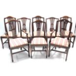 A set of eight Georgian style mahogany splat-back dining chairs (including a pair of carvers),