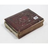 A Victorian leather-bound family photograph album containing forty carte-de-visite portrait