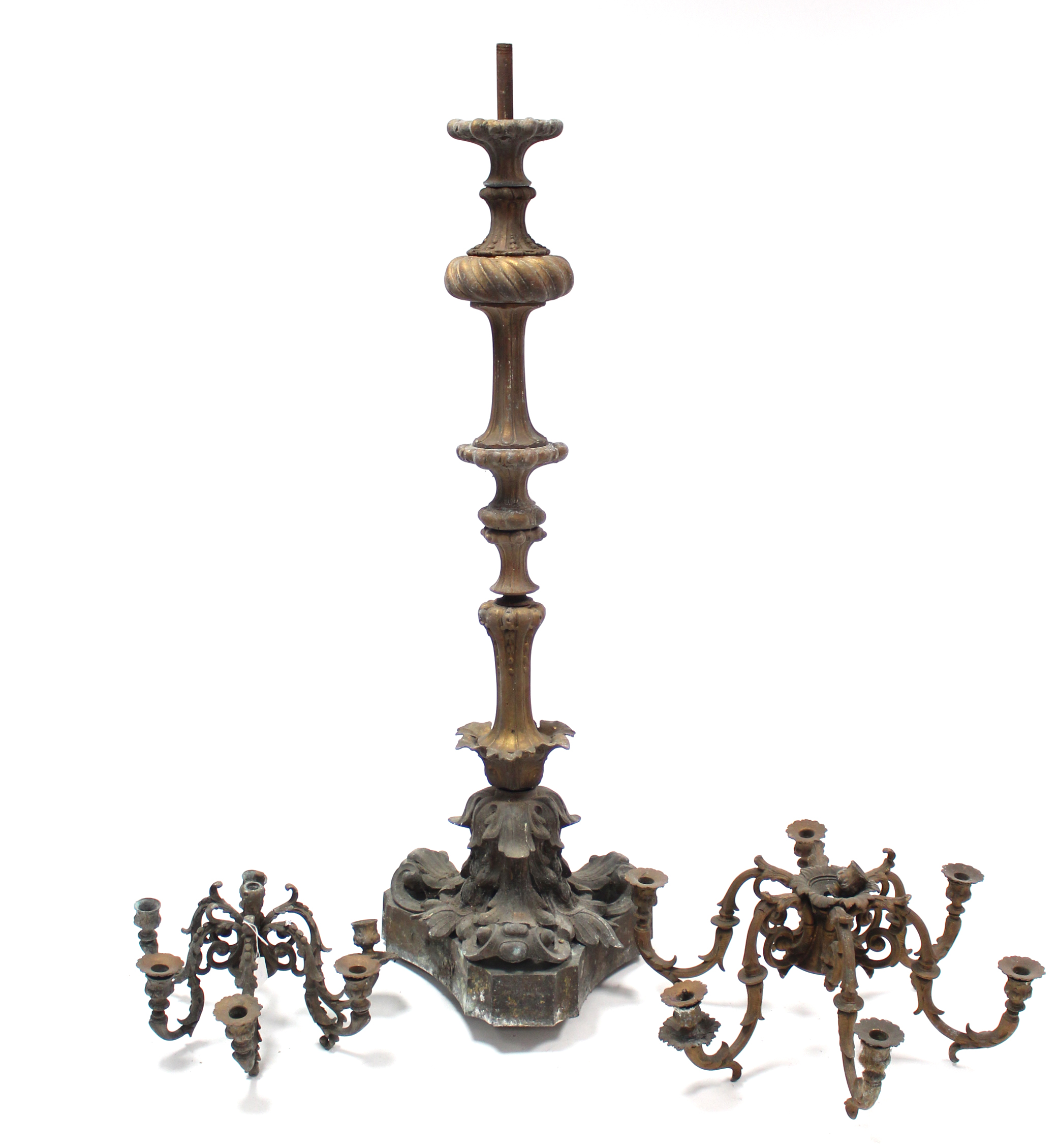 A gilt-metal standard lamp on triform base; two similar light fittings; a table lamp, etc.