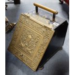 A Victorian sloping-front coal scuttle, 10¼” wide; a brass embossed slipperbox; two stoneware