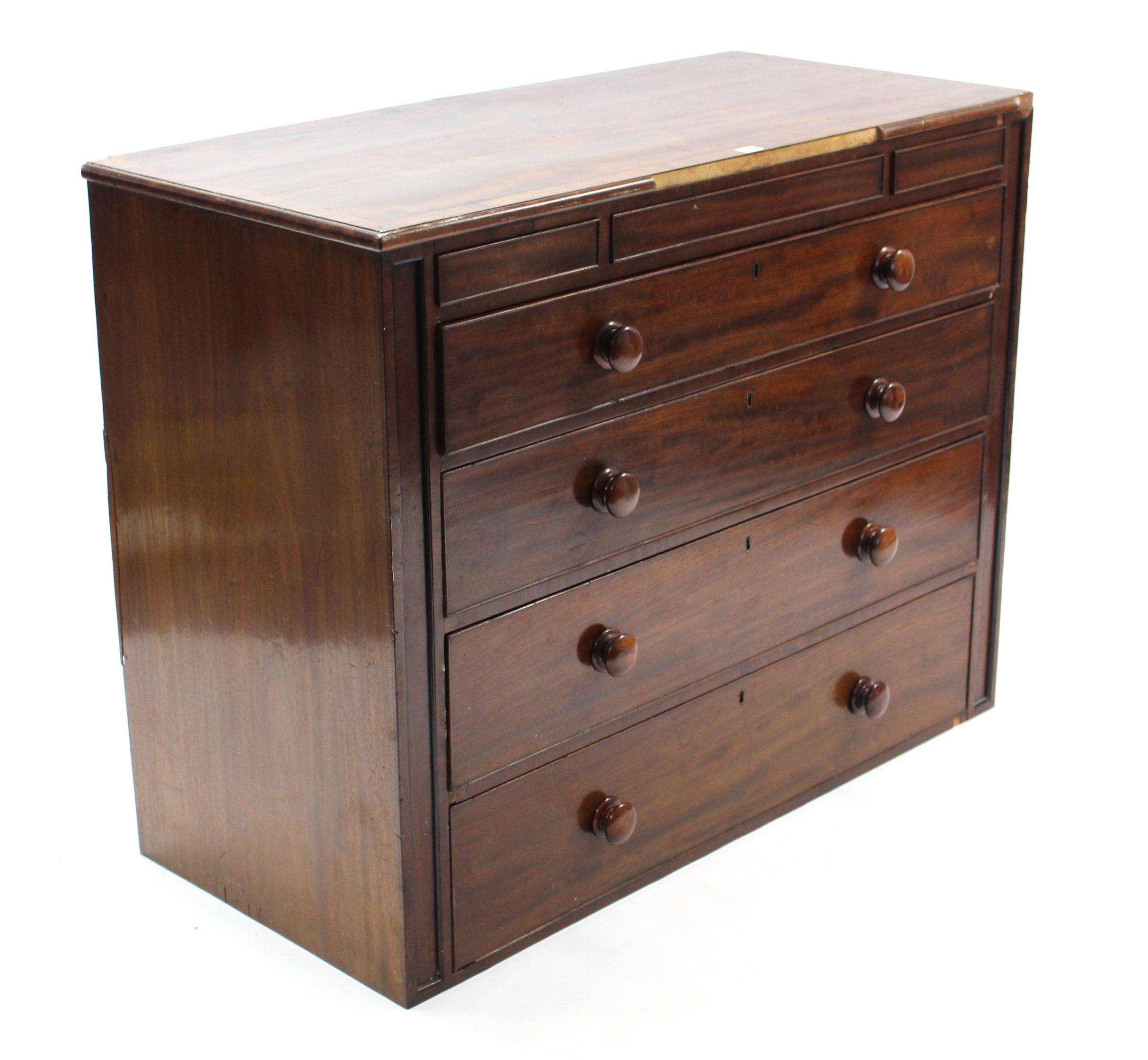 A 19th century inlaid-mahogany chest, fitted three shallow frieze drawers above four long