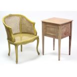 A continental-style yellow painted wooden frame bergere chair on cabriole legs (slight faults); &
