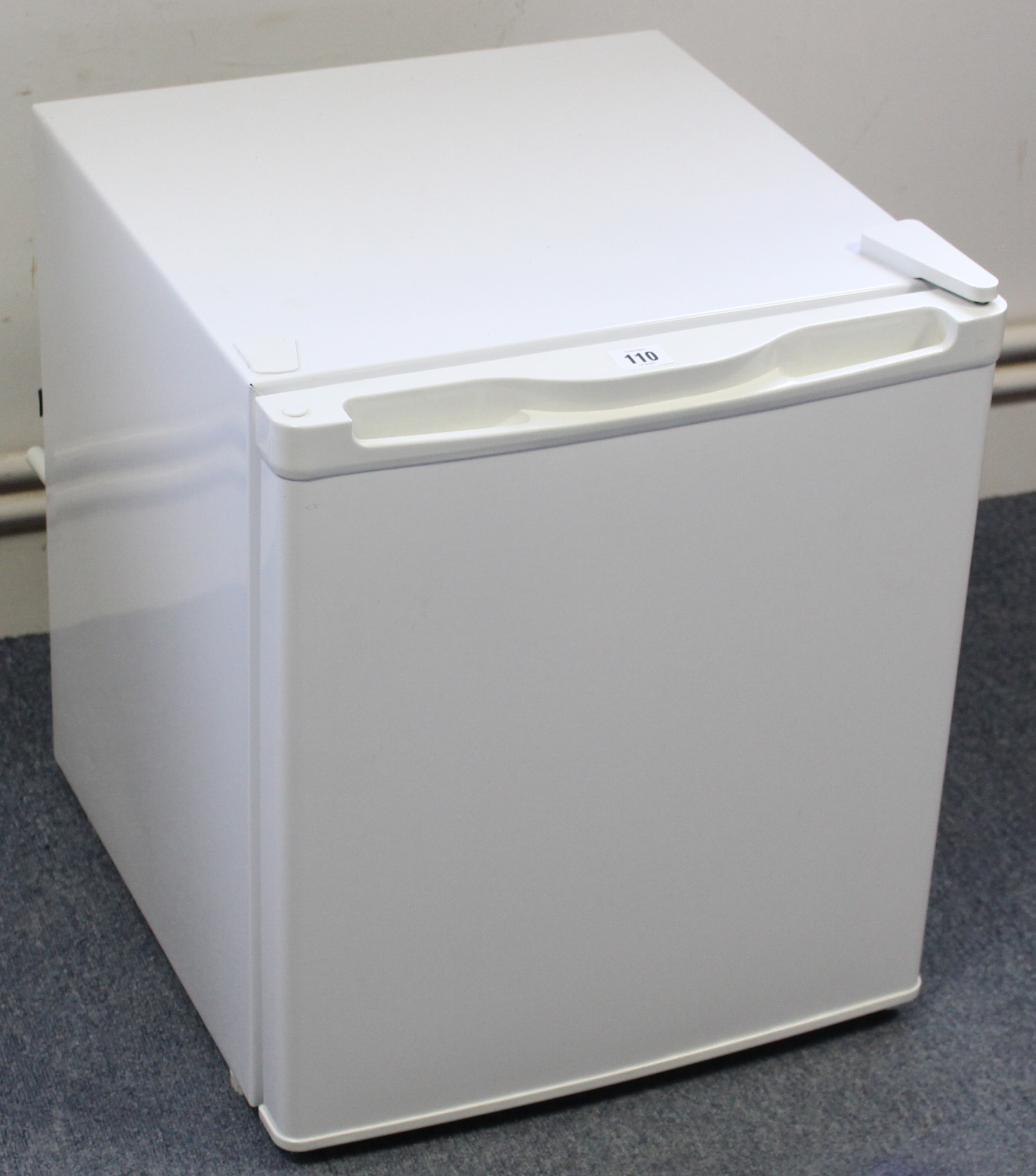 A Curry’s counter-top freezer in white-finish case, 17” wide x 20” high