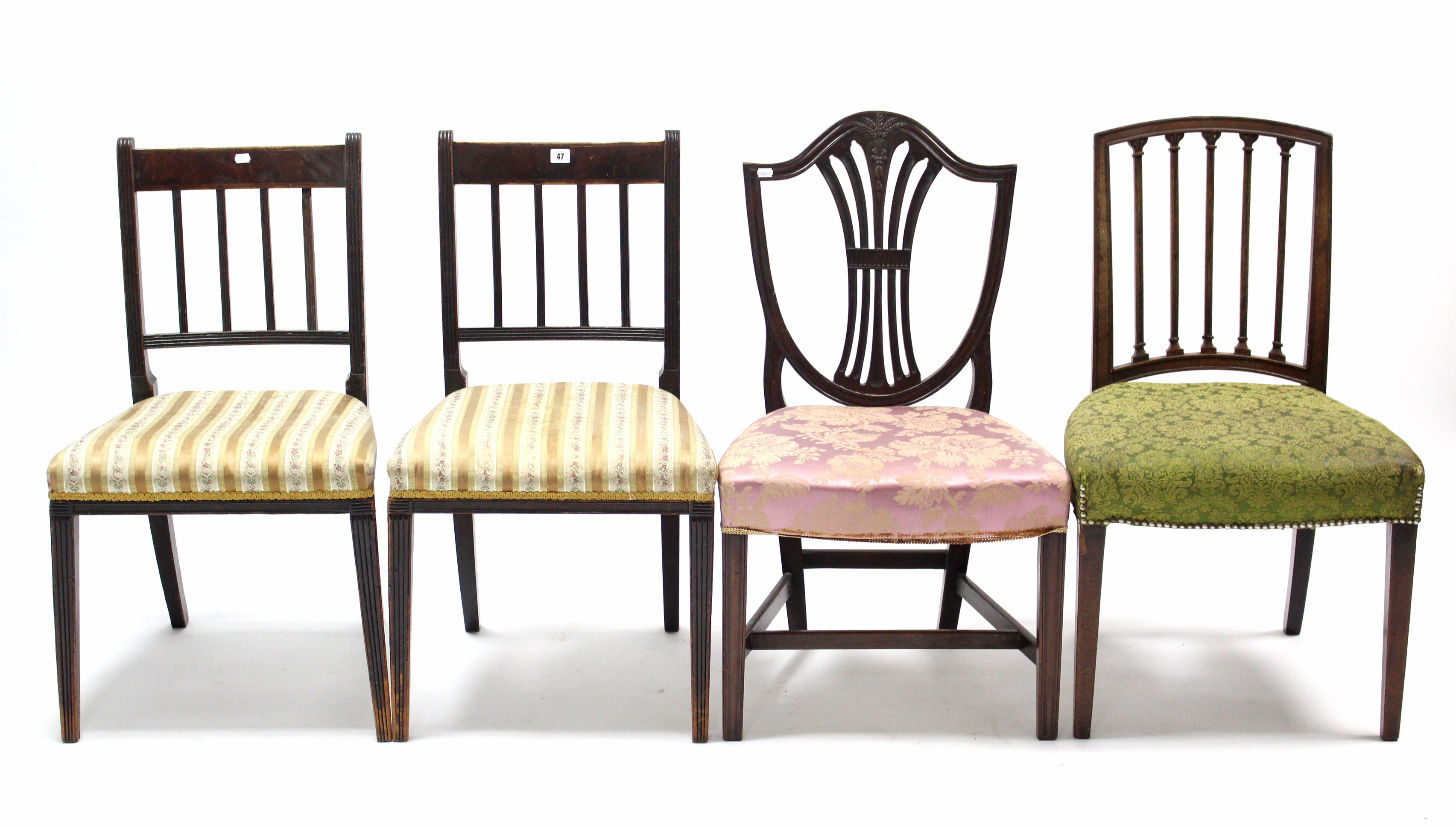 A pair of 19th century mahogany bow-back dining chairs with spring seats, & on square tapered