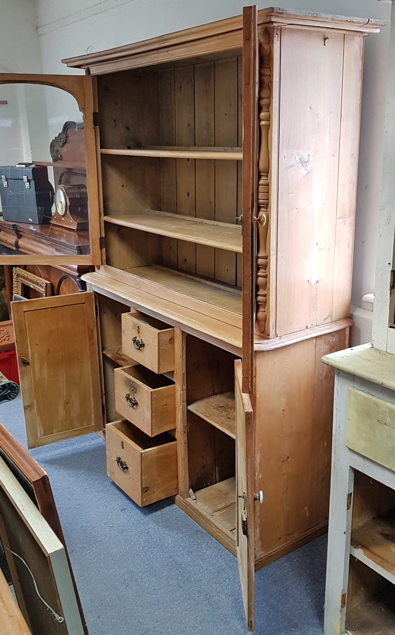 A VICTORIAN-STYLE PINE DRESSER, the upper part fitted two shelves enclosed by pair of glazed - Image 2 of 2