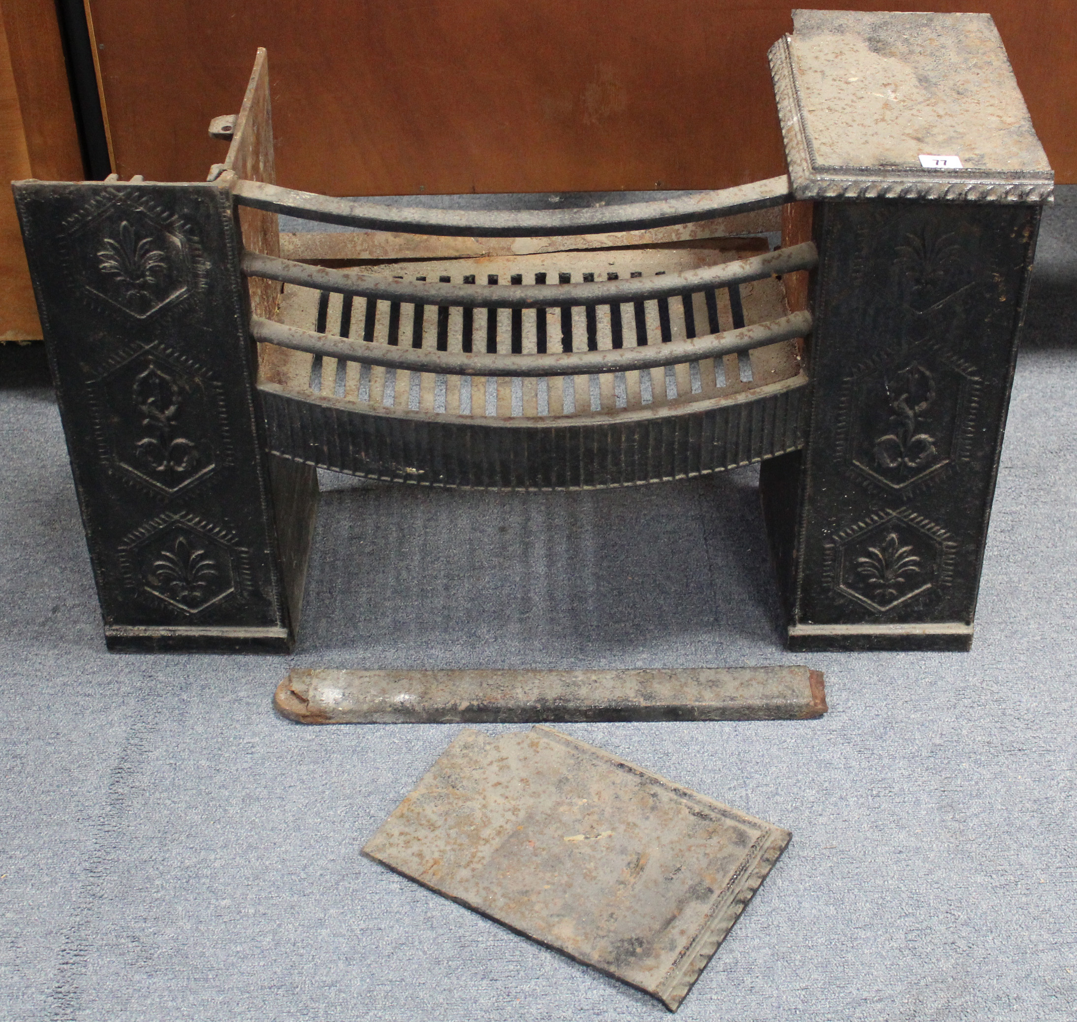 A black painted cast-iron fire-grate, 32” wide x 21” high; & approximately fifty brass stair-rods. - Image 3 of 3