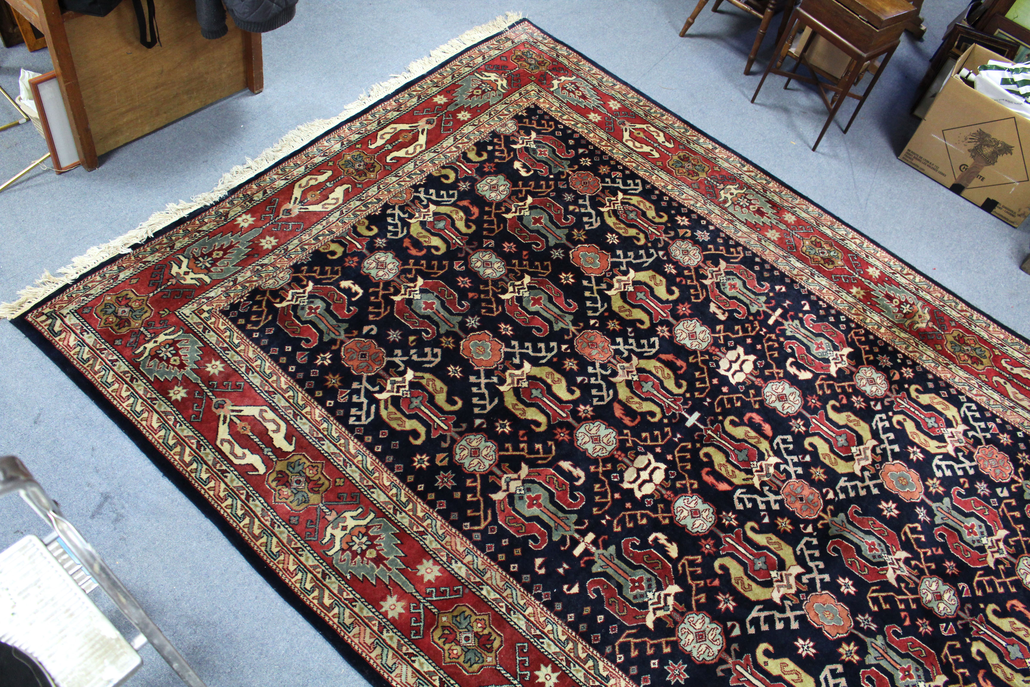 A Persian pattern carpet of crimson & ivory ground, with all-over repeating multi-coloured geometric - Image 4 of 4