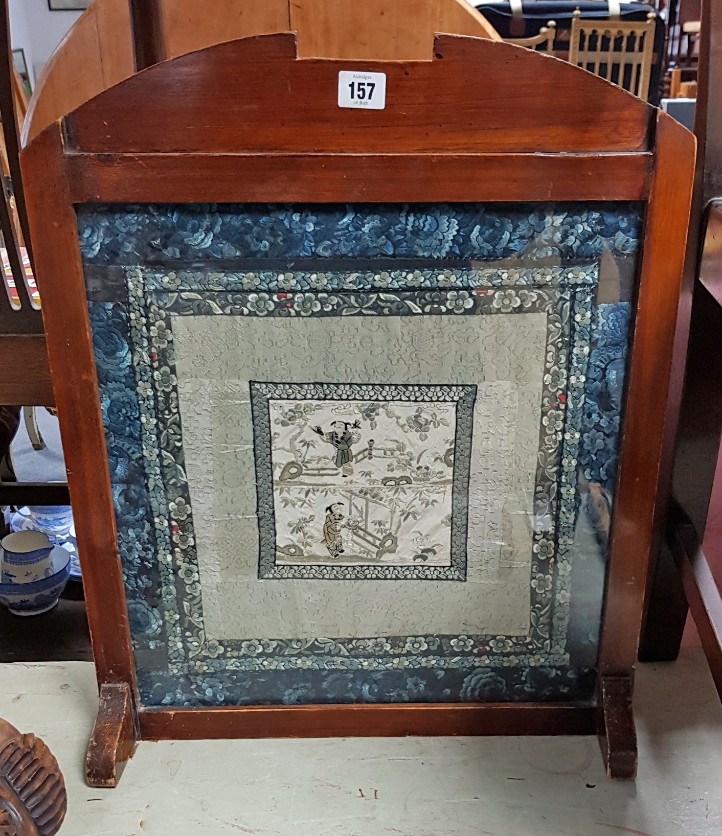 A mahogany frame fire screen inset Chinese embroidered panel; together with a part set of steak