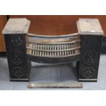 A black painted cast-iron fire-grate, 32” wide x 21” high; & approximately fifty brass stair-rods.