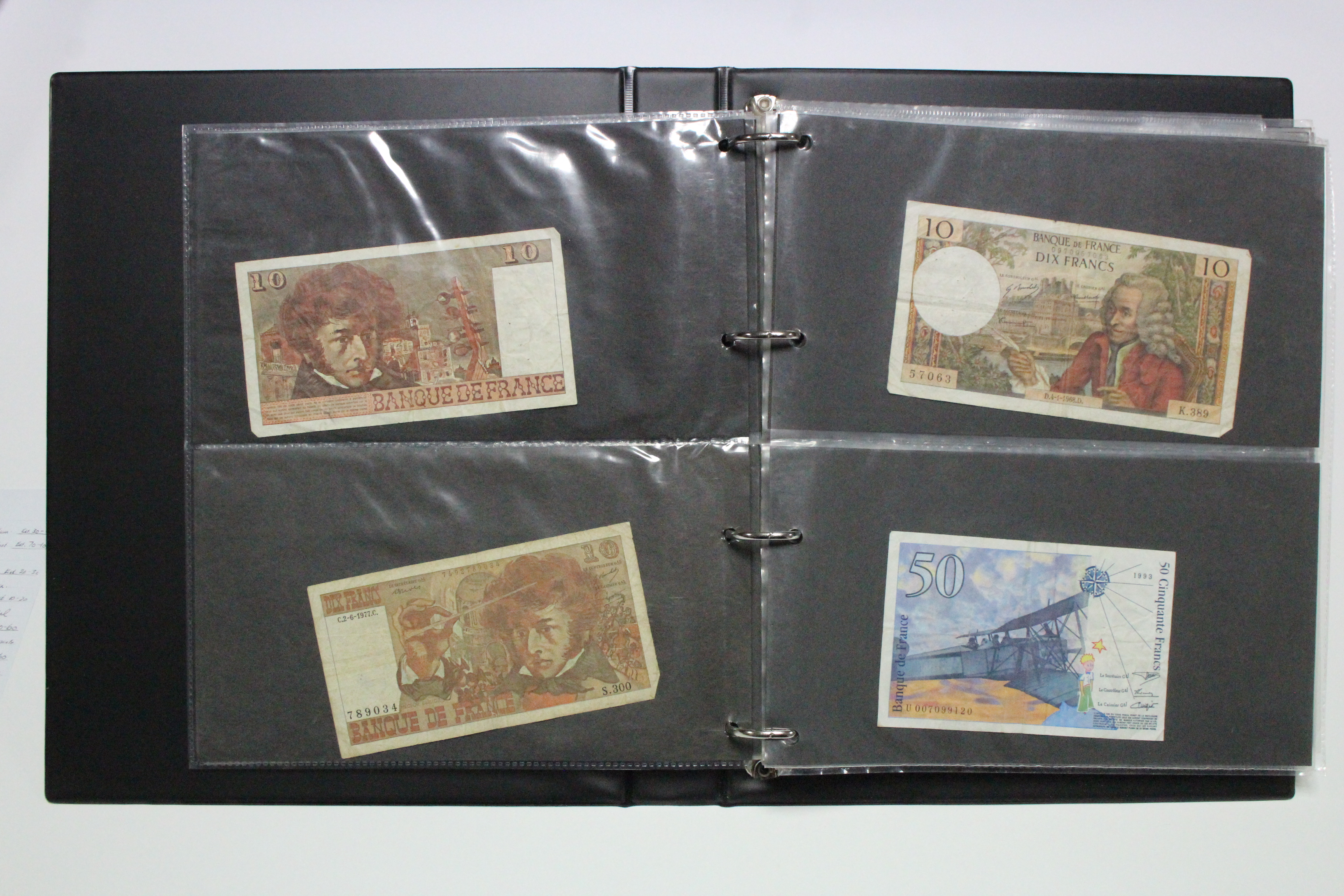 A collection of British & foreign banknotes, contained in a ring-binder album. - Image 3 of 8