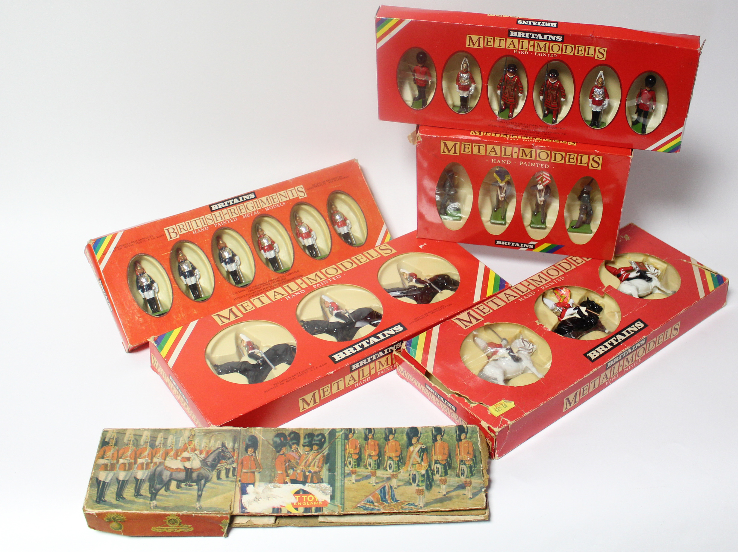Five sets of Britain’s figures (No’s 7205,7226,7227,7228, & 7306), all boxed; & a cardboard