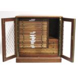 A collection of British & foreign coins & banknotes, contained in a mahogany coin collector’s cabine
