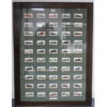 A display of John Player “Motor Cars” cigarette cards (50 of 50), in glazed wooden frame.