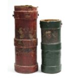 A 19th century crimson painted cordite case with coat-of-arms to the front, 23¾” high; & a similar