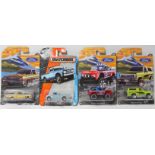 Fourteen Hot Wheels scale models each with original packaging.