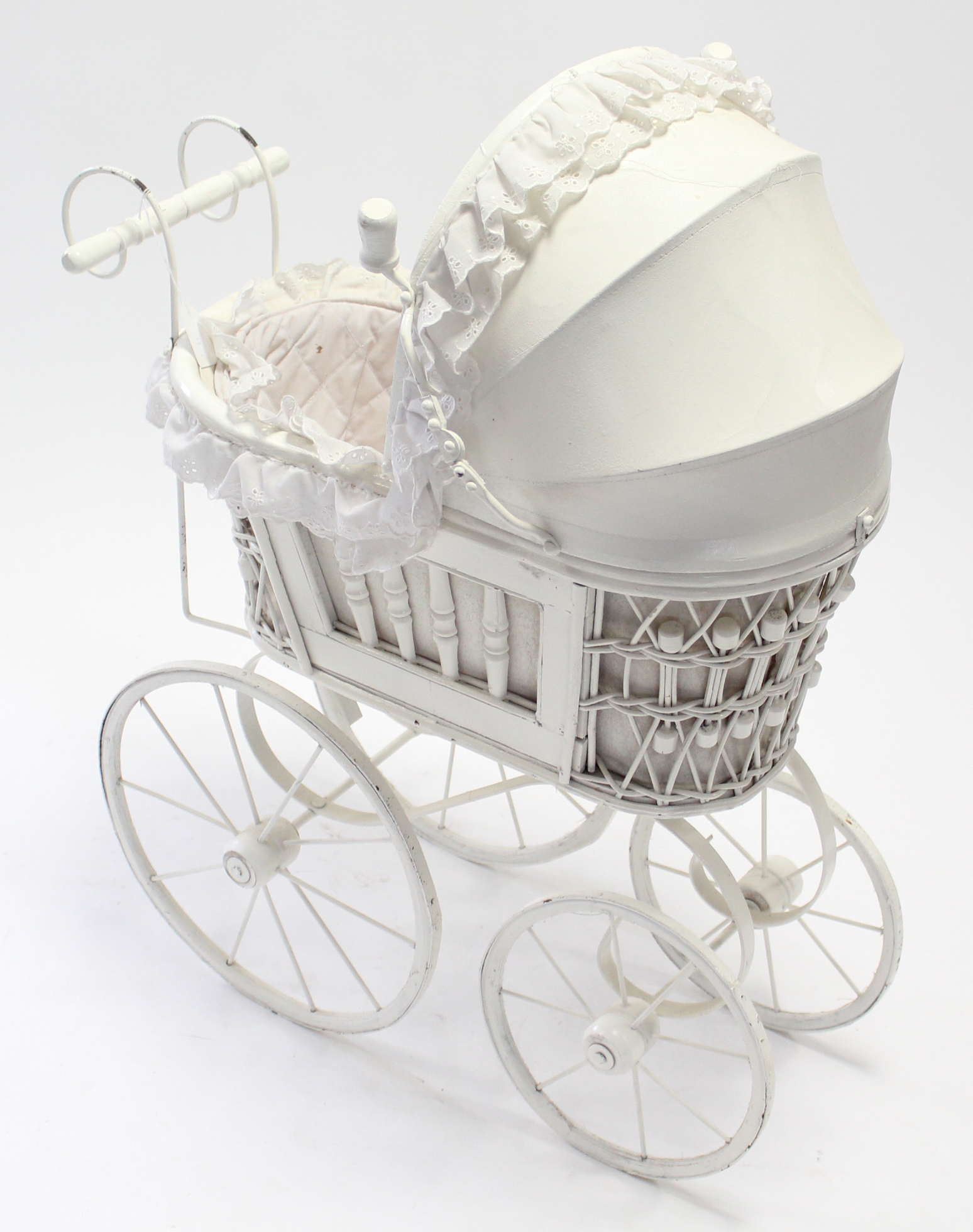 A Victorian style white wicker & wooden painted dolls pram, 24” long.