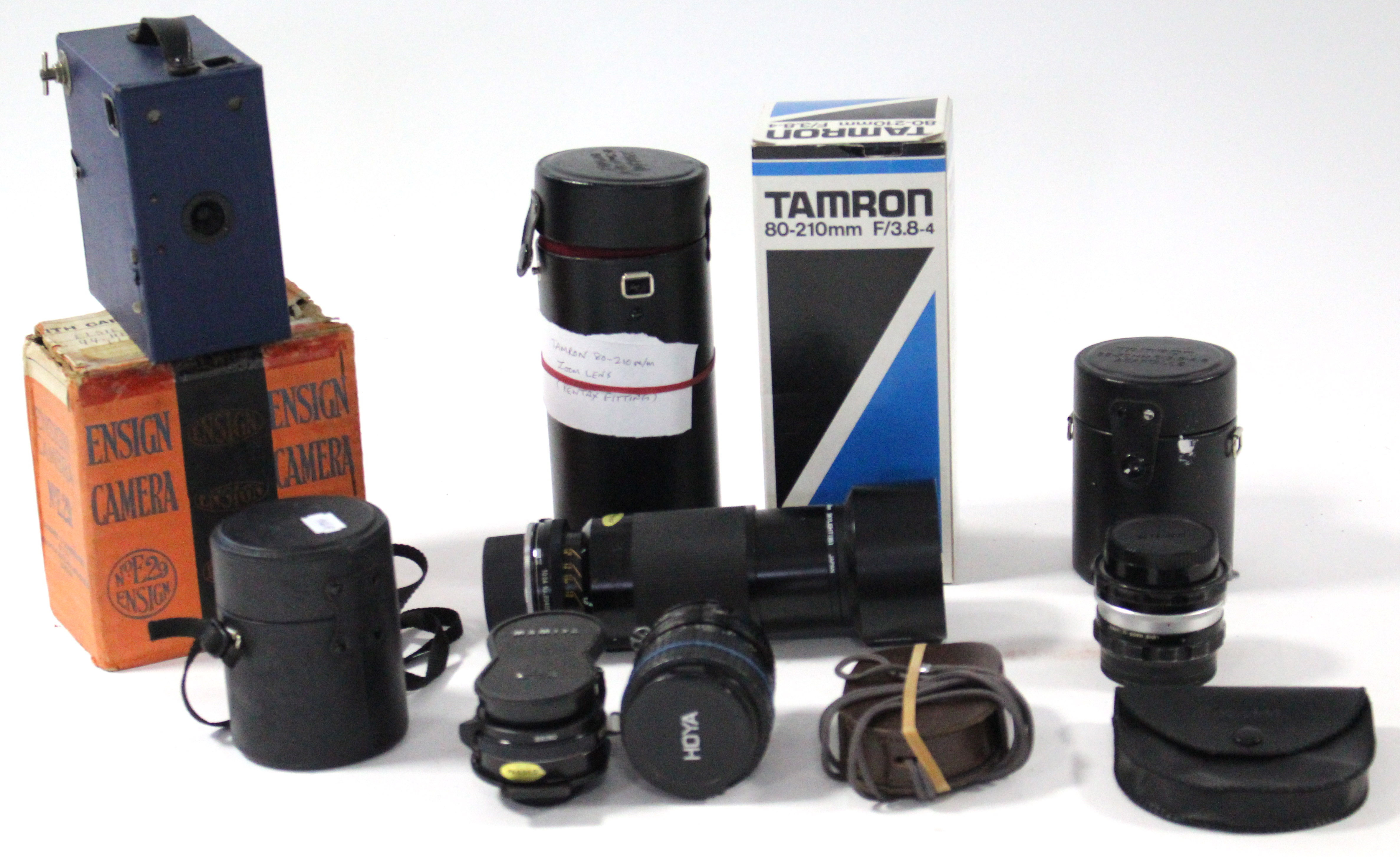 An Ensign “No. E29” box camera, boxed; six various lenses; & various other camera accessories.