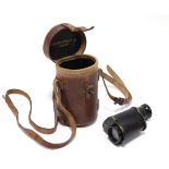 A WW1 British monocular by the Precision Optical Co. of London, with leather case.