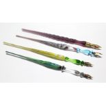 Four coloured glass fountain pens (one w.a.f.)