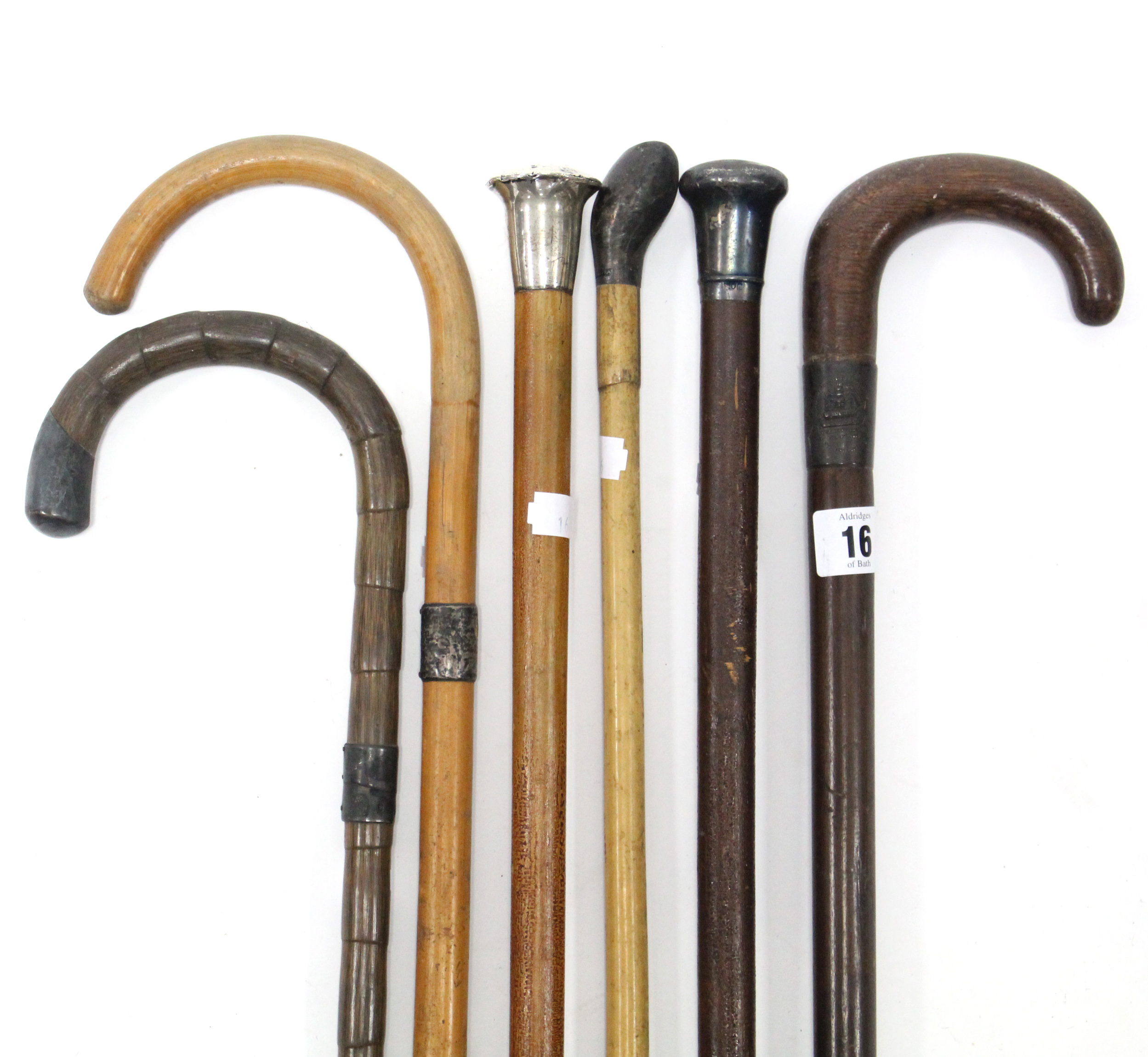 Six various walking canes, each with silver or silver plated mounts.