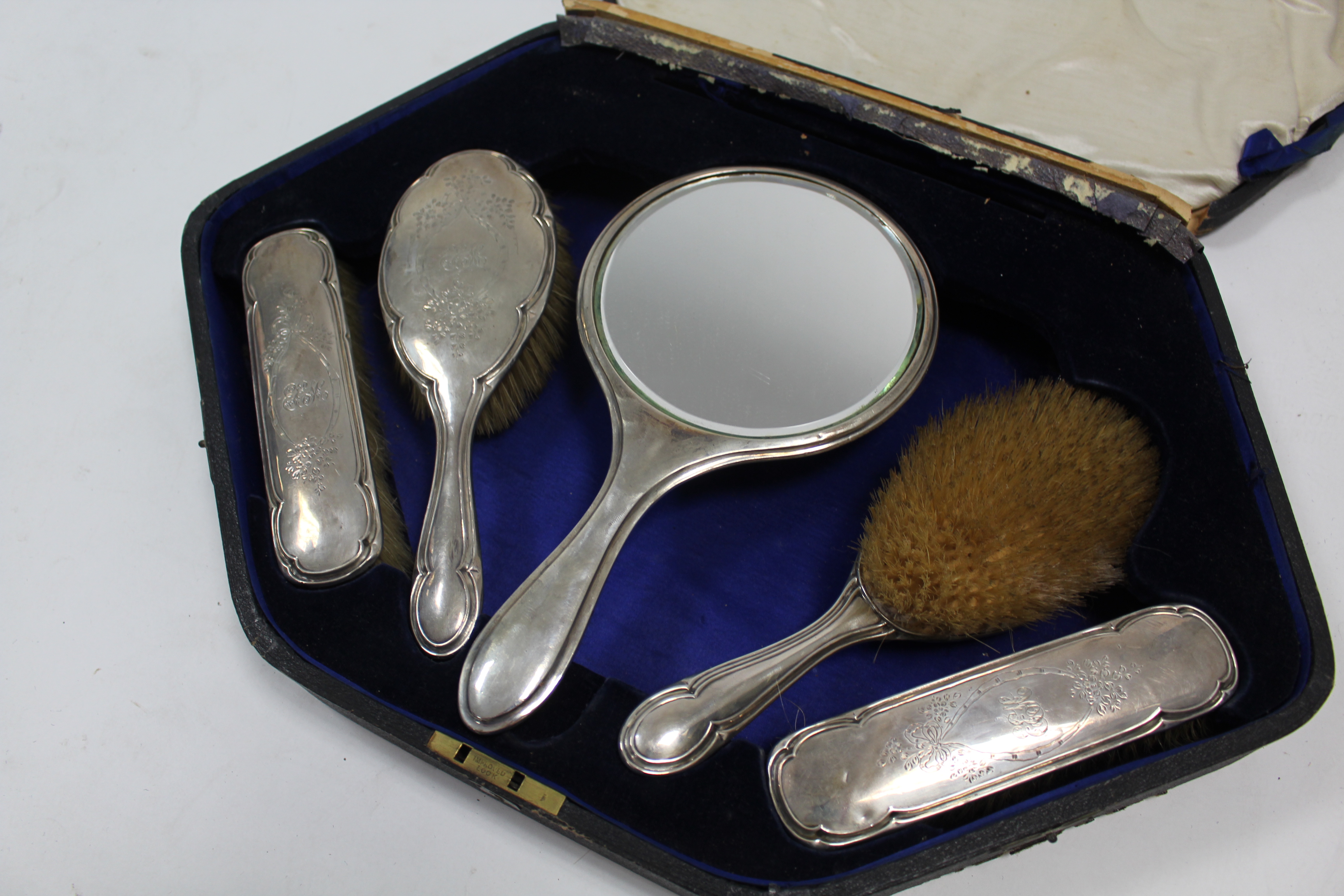 A George V silver-backed five-piece dressing table set, Birmingham 1916, cased. - Image 2 of 2