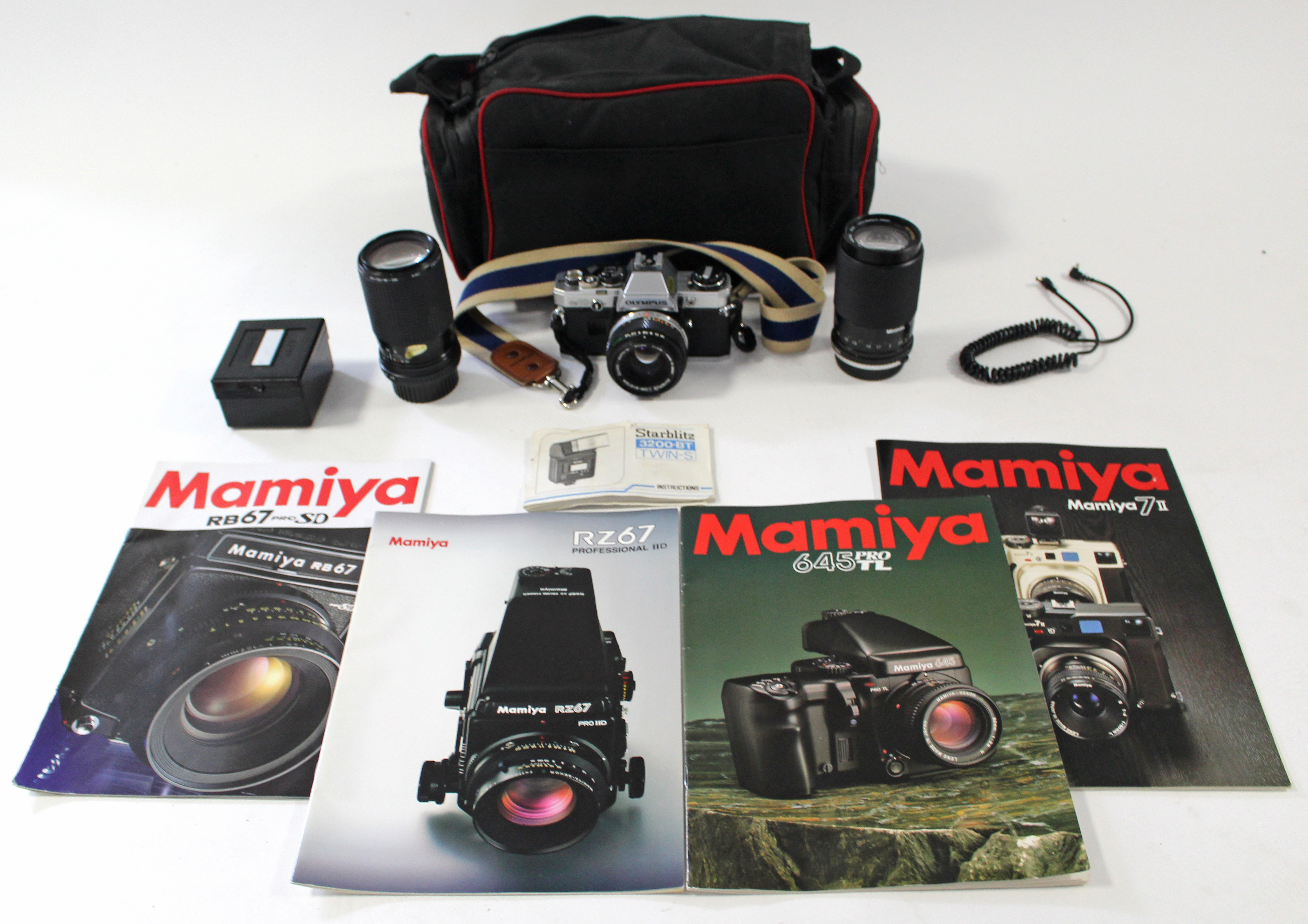 An Olympus “OM10” 50mm camera; & a Praktica “BC1” 50mm camera, each with accessories & case - Image 4 of 4