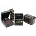 A Corona “Four” portable typewriter; a portable gramophone; a Philips valve radio in brown