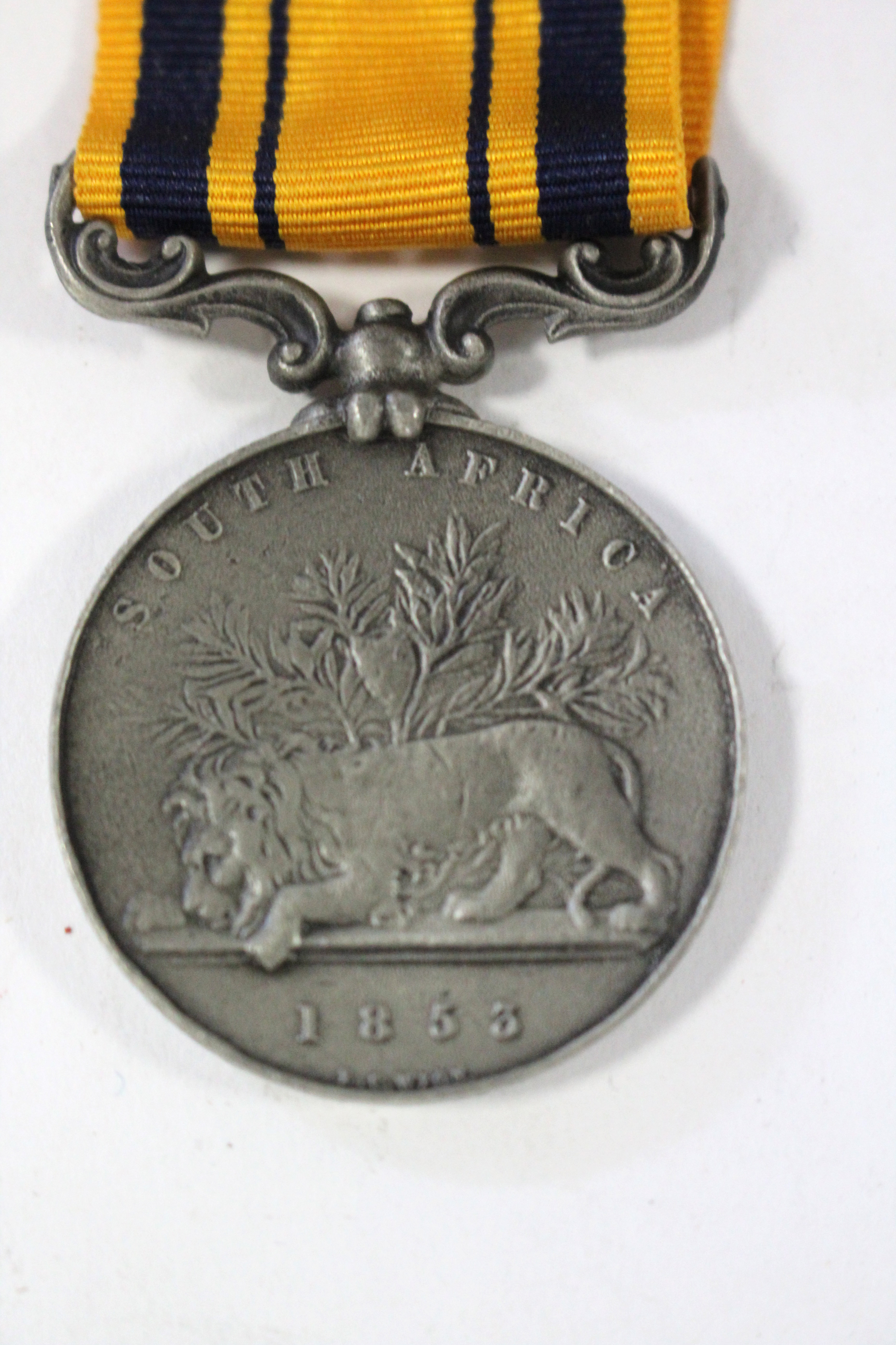 A replica “South Africa” (1853) medal with ribbon; a “British Red Cross” cap badge; two stoneware - Image 2 of 3