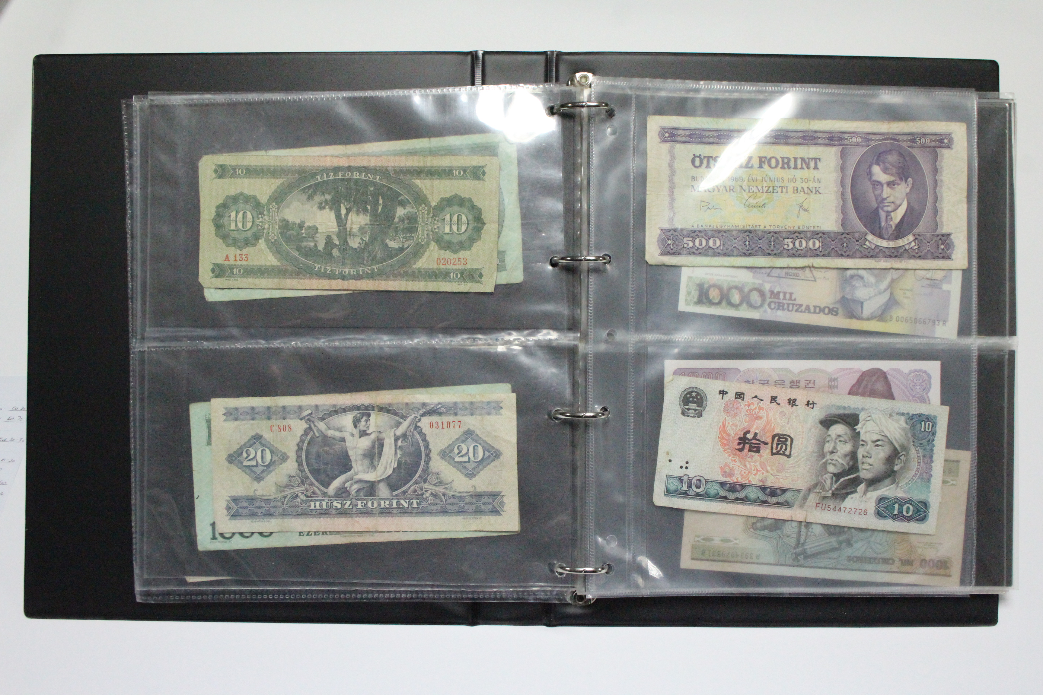 A collection of British & foreign banknotes, contained in a ring-binder album. - Image 4 of 8